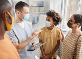 Family at doctor's visit_900x600